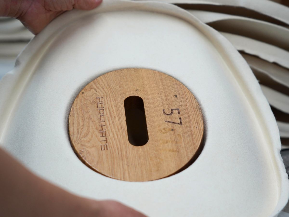 Hat finishing and decoration details in production