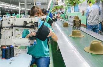 Workers in production line